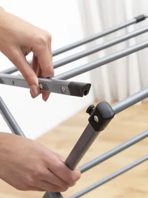 Skládací a rozkládací kovový sušák na prádlo s 3 výškami Cloxy InnovaGoods 11 tyčí