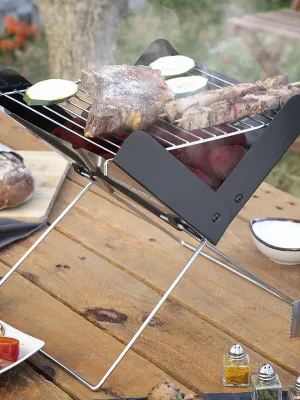 Přenosný skládací minigril na dřevěné uhlí Foldecue InnovaGoods