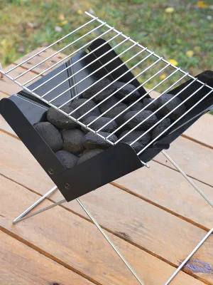 Přenosný skládací minigril na dřevěné uhlí Foldecue InnovaGoods